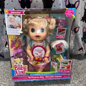 Baby alive brand new unused 2012 Real surprises baby